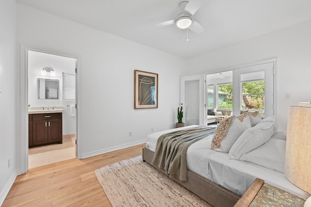 803 Jessie St, Austin, TX 78704 - bedroom featuring light wood-style floors, ensuite bath, and a ceiling fan