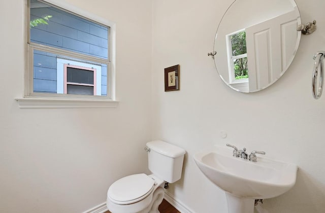 803 Jessie St, Austin, TX 78704 - half bathroom with a sink and toilet