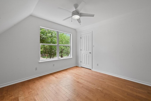 803 Jessie St, Austin, TX 78704 - unfurnished bedroom featuring light wood finished floors, lofted ceiling, and a ceiling fan