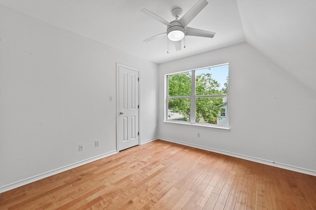 803 Jessie St, Austin, TX 78704 - unfurnished bedroom featuring light wood-style floors, vaulted ceiling, and ceiling fan