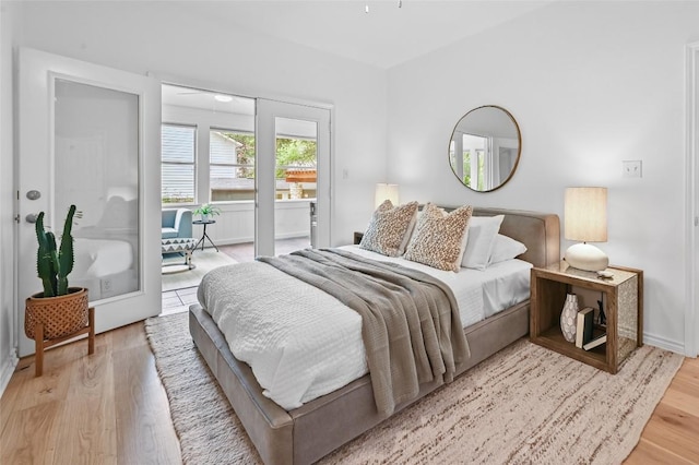 803 Jessie St, Austin, TX 78704 - bedroom featuring wood finished floors and baseboards