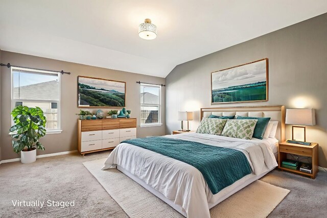 805 Red Tails Dr, Austin, TX 78725 - bedroom featuring light colored carpet and vaulted ceiling