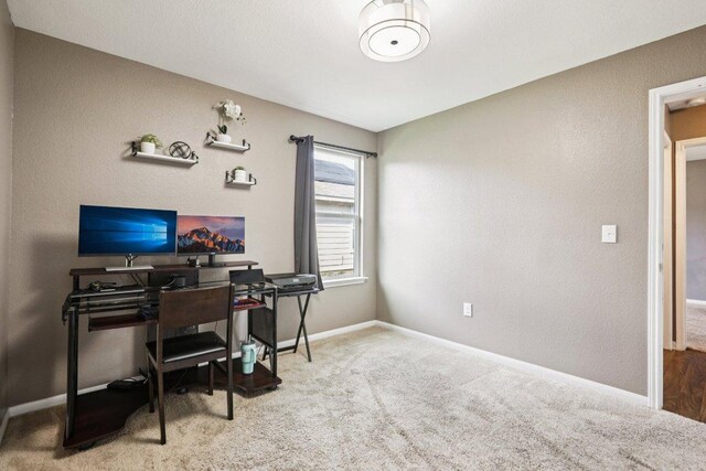 805 Red Tails Dr, Austin, TX 78725 - carpeted home office featuring baseboards