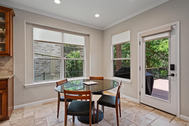 6906 Covered Bridge Dr, Austin, TX 78736 - dining space featuring ornamental molding, stone tile flooring, and recessed lighting