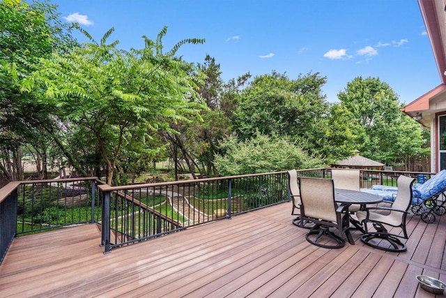 6906 Covered Bridge Dr, Austin, TX 78736 - wooden deck featuring outdoor dining space