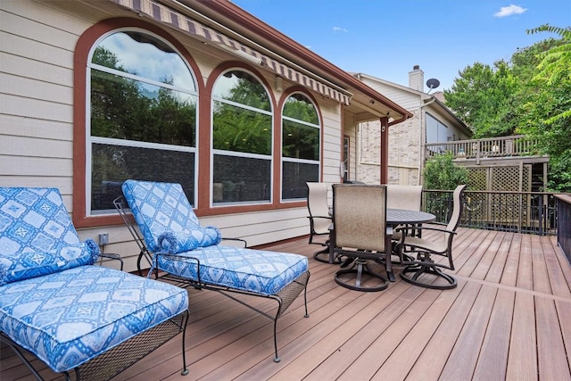 6906 Covered Bridge Dr, Austin, TX 78736 - wooden deck featuring outdoor dining area