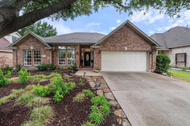 14932 Thatcher Dr, Austin, TX 78717 - view of front of home with an attached garage, brick siding, concrete driveway, and a shingled roof