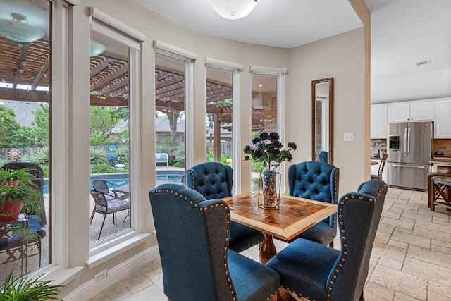 14932 Thatcher Dr, Austin, TX 78717 - dining area with stone tile floors