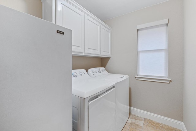 14932 Thatcher Dr, Austin, TX 78717 - laundry area featuring washer and clothes dryer and cabinet space