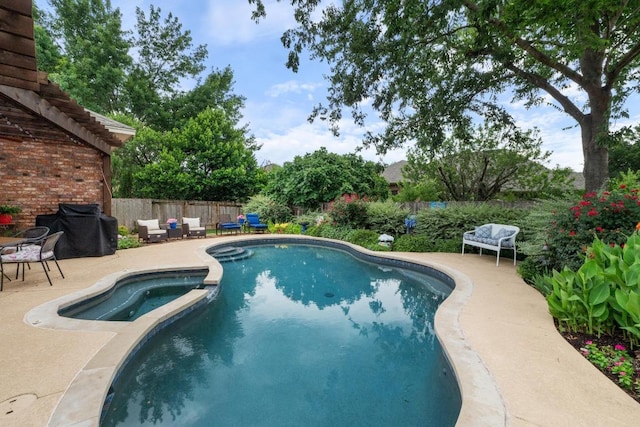 14932 Thatcher Dr, Austin, TX 78717 - view of swimming pool with a patio, a fenced backyard, a grill, and a pool with connected hot tub