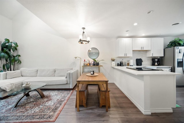 1135 Barton Hills Dr Unit 355, Austin, TX 78704 - living room with dark wood-style flooring, a chandelier, and recessed lighting