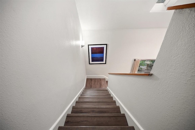 1135 Barton Hills Dr Unit 355, Austin, TX 78704 - stairs with wood finished floors and a textured wall