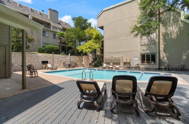 1135 Barton Hills Dr Unit 355, Austin, TX 78704 - community pool featuring a wooden deck