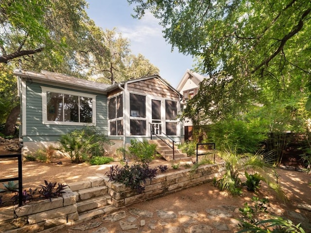 1005 E Riverside Dr, Austin, TX 78704 - rear view of property featuring a sunroom