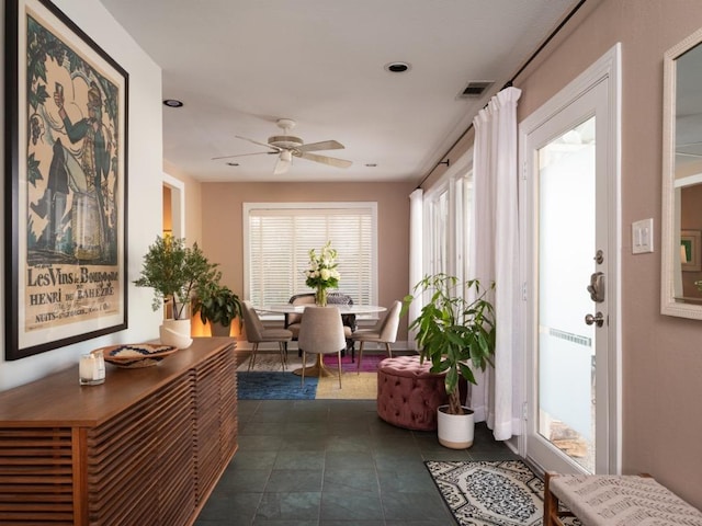 1005 E Riverside Dr, Austin, TX 78704 - entrance foyer featuring dark tile patterned flooring, a ceiling fan, and recessed lighting