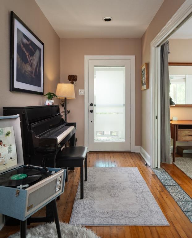1005 E Riverside Dr, Austin, TX 78704 - entrance foyer featuring hardwood / wood-style flooring and baseboards