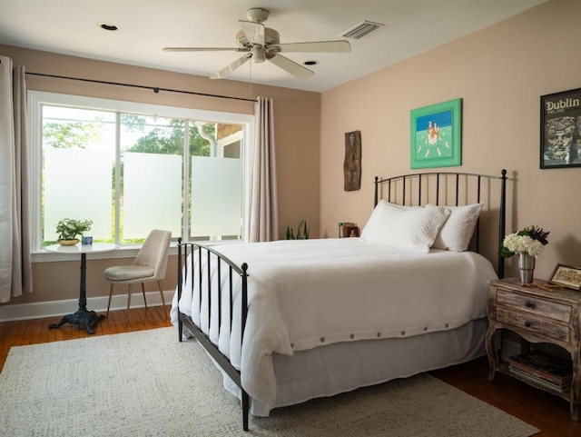 1005 E Riverside Dr, Austin, TX 78704 - bedroom featuring wood finished floors and a ceiling fan