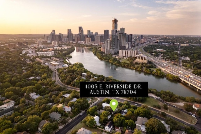 1005 E Riverside Dr, Austin, TX 78704 - aerial view at dusk of a view of skyline, a water view, and a notable bridge
