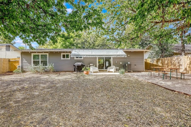 5317 Westminster Dr, Austin, TX 78723 - back of house with a patio