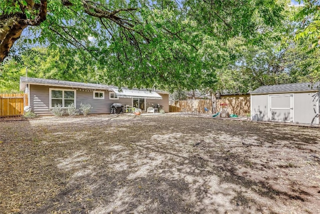 5317 Westminster Dr, Austin, TX 78723 - back of property with a storage unit