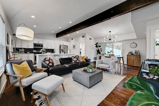 5317 Westminster Dr, Austin, TX 78723 - living area with a chandelier, recessed lighting, wood finished floors, and beamed ceiling