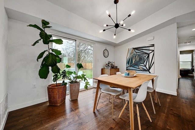 5317 Westminster Dr, Austin, TX 78723 - dining space with a chandelier and wood-type flooring