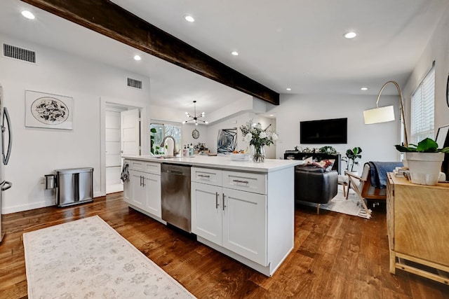 5317 Westminster Dr, Austin, TX 78723 - kitchen featuring stainless steel dishwasher, white cabinetry, light countertops, recessed lighting, and a center island with sink