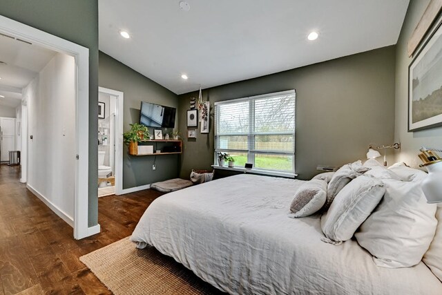 5317 Westminster Dr, Austin, TX 78723 - bedroom with recessed lighting, vaulted ceiling, wood finished floors, and connected bathroom