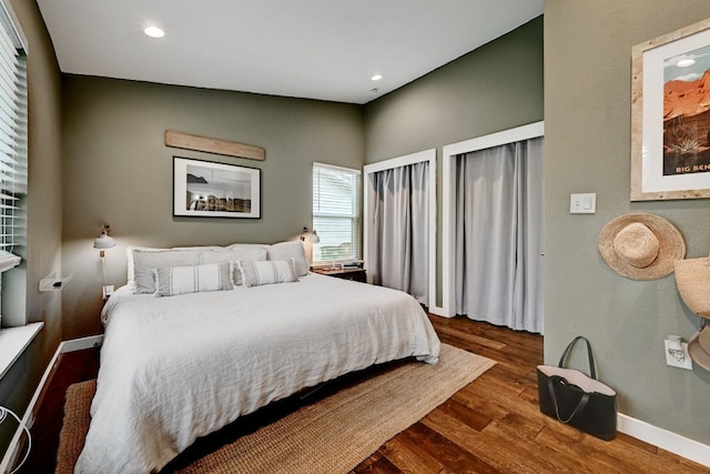 5317 Westminster Dr, Austin, TX 78723 - bedroom with multiple closets, dark wood-type flooring, and recessed lighting