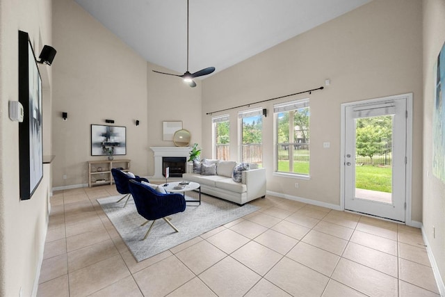 4009 Wilderness Path Bnd, Cedar Park, TX 78613 - living area featuring a towering ceiling, a fireplace, and light tile patterned floors