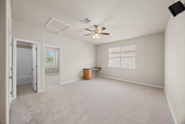 4009 Wilderness Path Bnd, Cedar Park, TX 78613 - unfurnished bedroom featuring carpet floors, ceiling fan, and attic access