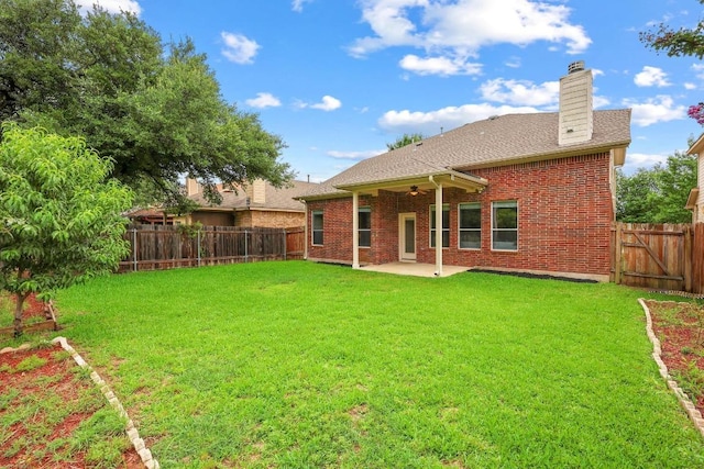 4009 Wilderness Path Bnd, Cedar Park, TX 78613 - back of house featuring a patio, a fenced backyard, a chimney, brick siding, and ceiling fan
