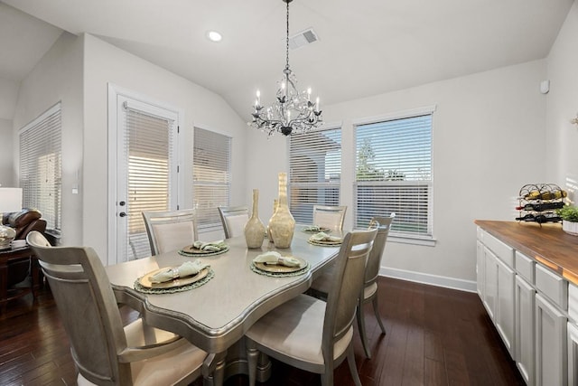 509 Fair Oaks Dr, Georgetown, TX 78628 - dining space with a chandelier, dark wood-style floors, recessed lighting, and vaulted ceiling