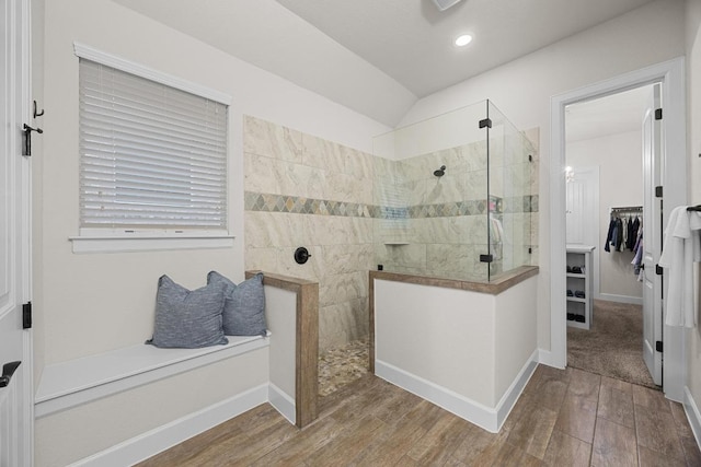 509 Fair Oaks Dr, Georgetown, TX 78628 - bathroom featuring wood finished floors, walk in shower, a spacious closet, recessed lighting, and lofted ceiling