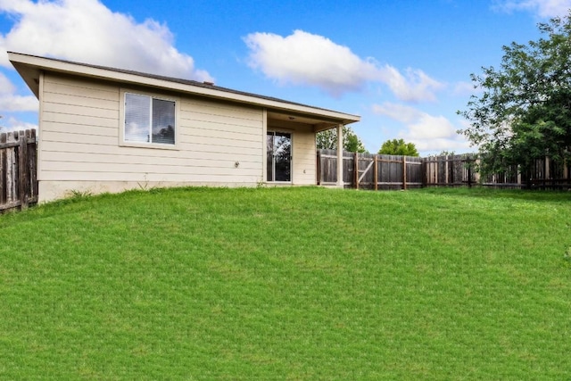 109 Onyx Lake Dr, Kyle, TX 78640 - back of house with a fenced backyard