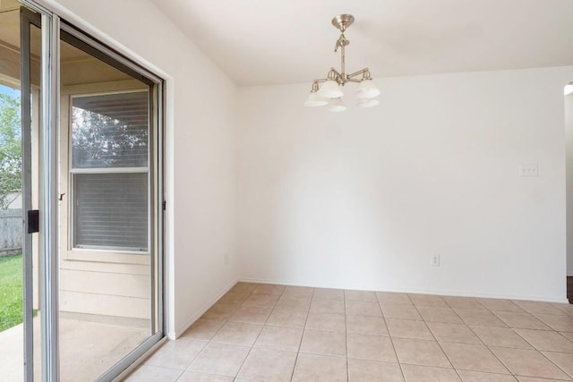 109 Onyx Lake Dr, Kyle, TX 78640 - unfurnished room with a chandelier and light tile patterned floors
