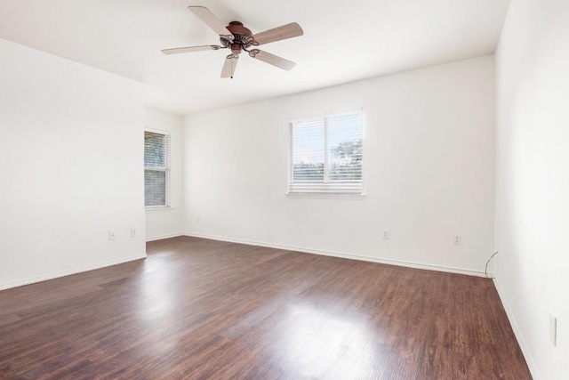 109 Onyx Lake Dr, Kyle, TX 78640 - spare room with plenty of natural light, dark wood-type flooring, and a ceiling fan