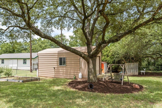 1601 Samoa Ct, Pflugerville, TX 78660 - back of house with a vegetable garden