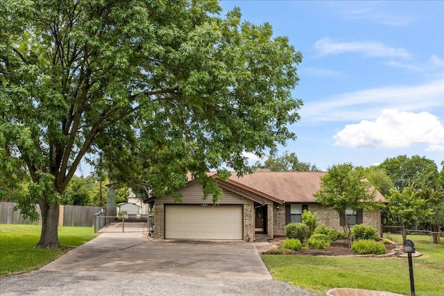 1601 Samoa Ct, Pflugerville, TX 78660 - view of front of house with concrete driveway, a garage, a gate, and brick siding