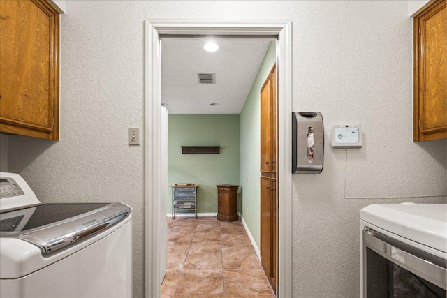 1601 Samoa Ct, Pflugerville, TX 78660 - laundry area with cabinet space and separate washer and dryer