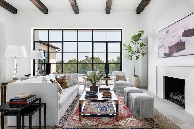 4401 Amarra Dr Unit 19, Austin, TX 78735 - living area with beamed ceiling, a fireplace, and tile patterned floors