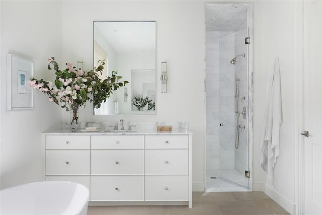 4401 Amarra Dr Unit 19, Austin, TX 78735 - bathroom featuring a shower stall, vanity, and a freestanding tub