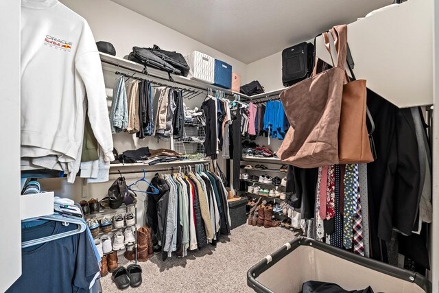 112 Wichita River Rd, Hutto, TX 78634 - walk in closet featuring carpet flooring
