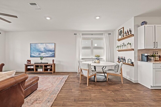 112 Wichita River Rd, Hutto, TX 78634 - dining room with dark wood-style floors, a ceiling fan, and recessed lighting