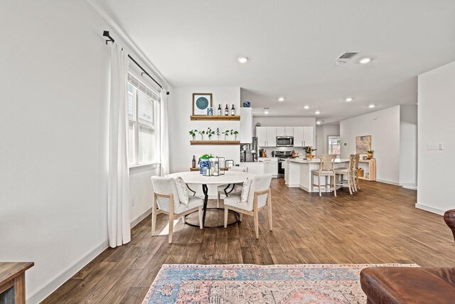 112 Wichita River Rd, Hutto, TX 78634 - dining room featuring wood finished floors and recessed lighting