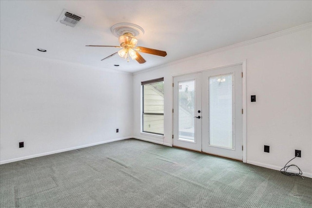 501 Highlands Blvd Unit 13, Horseshoe Bay, TX 78657 - carpeted spare room featuring french doors, ceiling fan, and ornamental molding