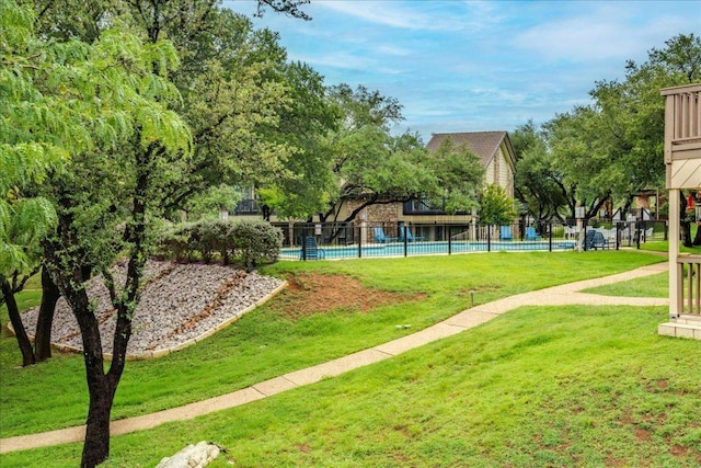 501 Highlands Blvd Unit 13, Horseshoe Bay, TX 78657 - view of home's community with a swimming pool