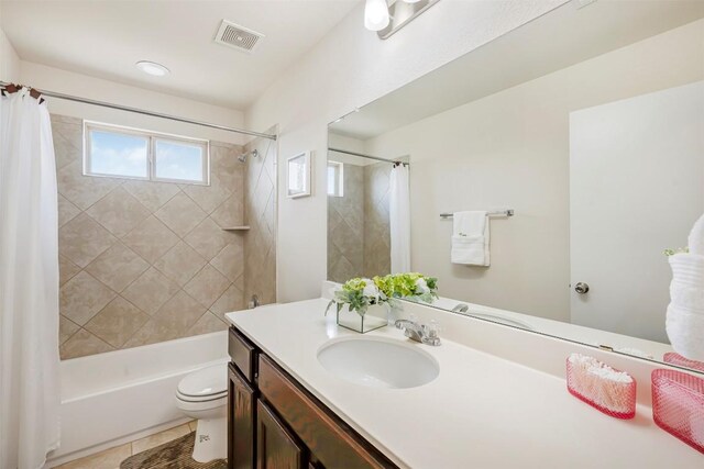 221 Pearl Way, Buda, TX 78610 - full bath featuring shower / bath combo with shower curtain, vanity, and tile patterned flooring
