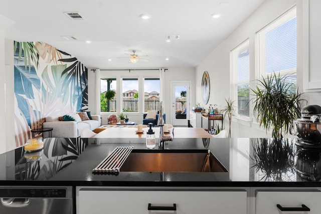 3800 Bristol Motor Pass, Austin, TX 78728 - kitchen featuring plenty of natural light, a ceiling fan, recessed lighting, dark countertops, and open floor plan
