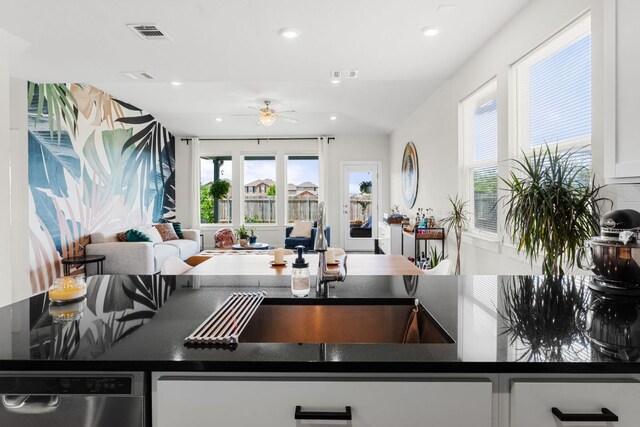 3800 Bristol Motor Pass, Austin, TX 78728 - kitchen with plenty of natural light, ceiling fan, recessed lighting, dark countertops, and open floor plan